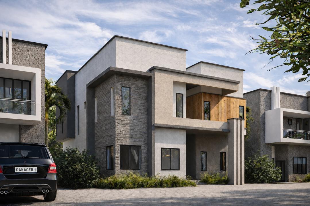 Two-storey duplex in grey stone with a car bearing the OAKACER 1 plate outside